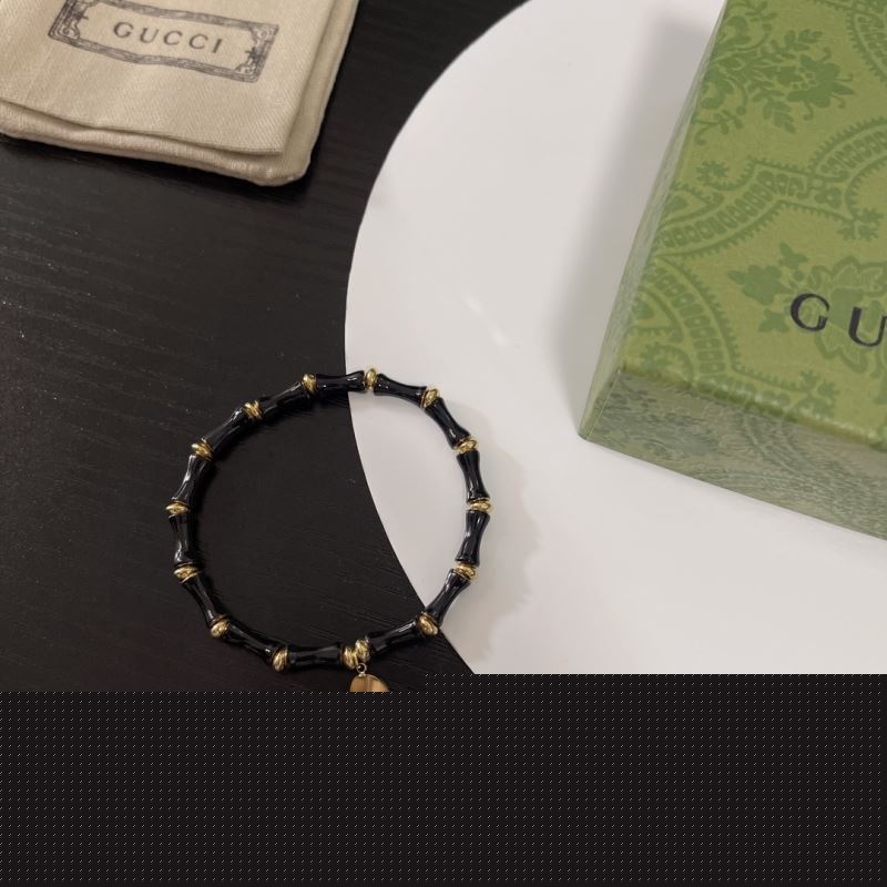 G*u*i bracelets